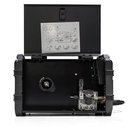 Open black hard case showing internal components, with a printed schematic diagram attached to the inner lid, photographed on a white studio background.