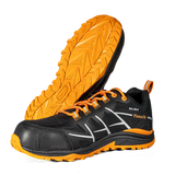 A pair of black and orange athletic shoes, with one shoe standing upright to show the side profile and the other lying on its side to display the textured orange outsole. The shoes feature white graphic accents on the side, orange laces, and the brand name 'Pinnacle' along with 'SOLOMON' printed on the side.